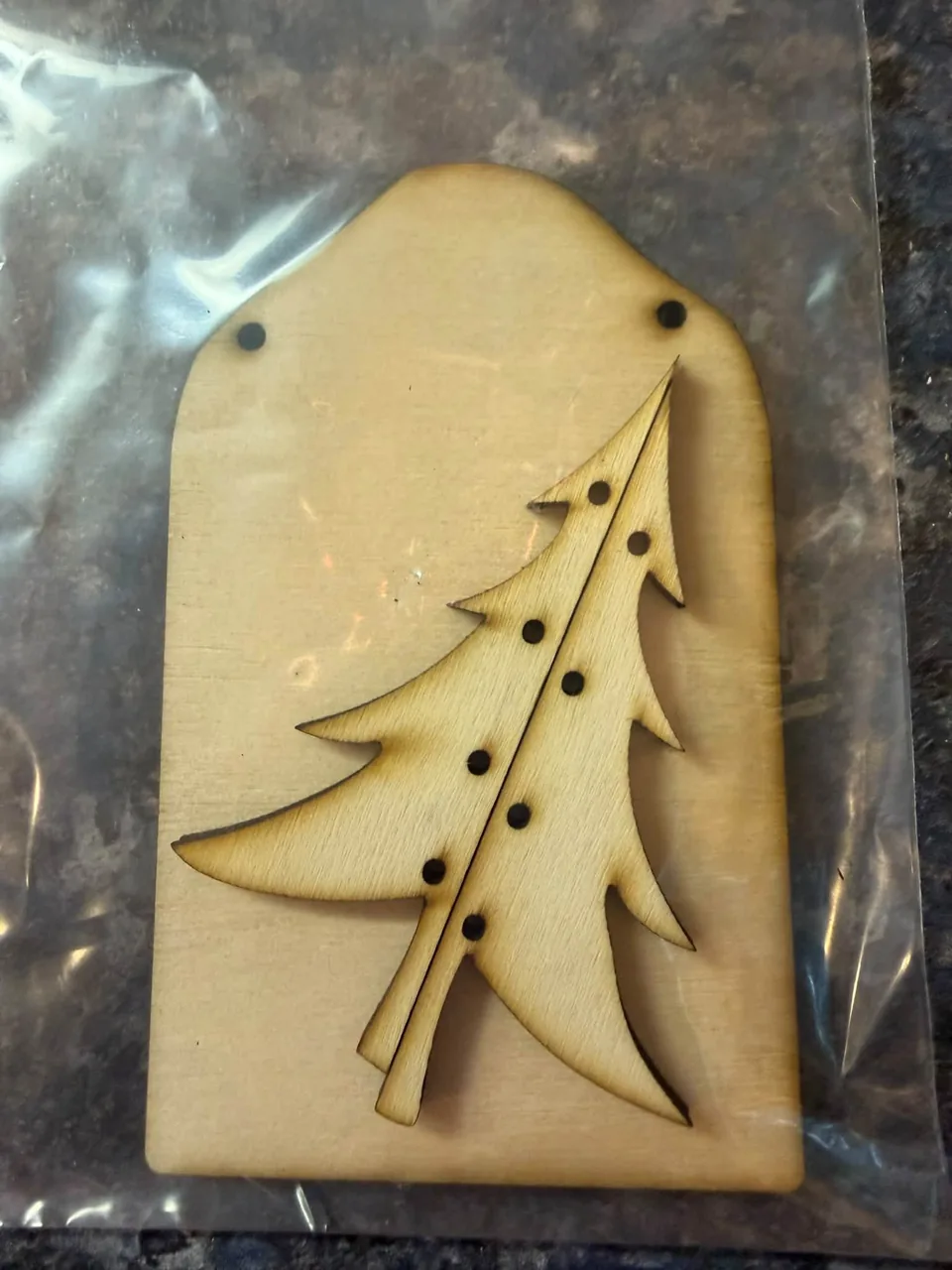 Wooden Christmas tree ornament on a layered tag