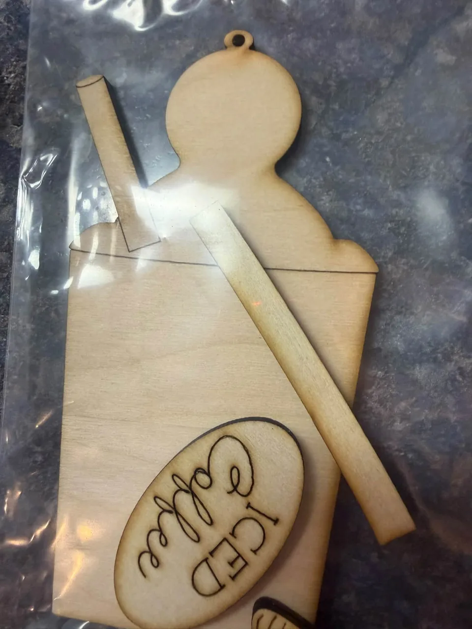 Wooden snowman with Frosty’s Cafe design