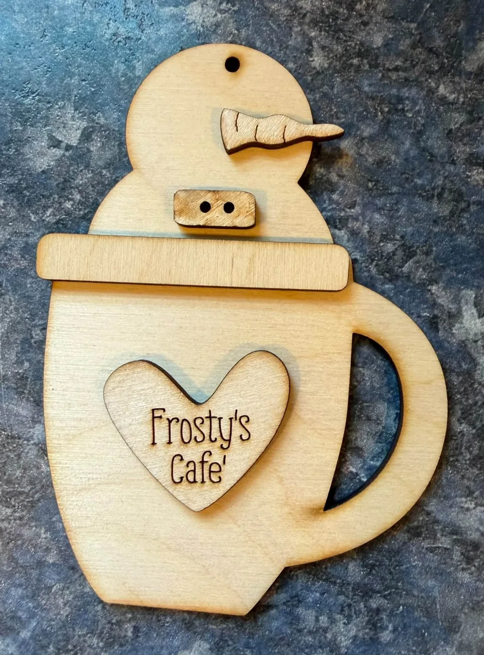 Wooden snowman mug with Frosty’s Cafe lettering