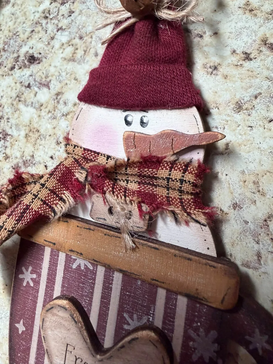 Snowman ornament with burgundy hat and plaid scarf